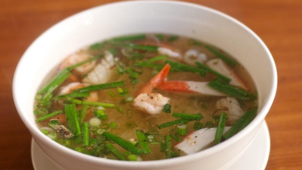 22. Mi Hai San · Shrimp, crab stick, shrimp balls, squid with egg noodle.