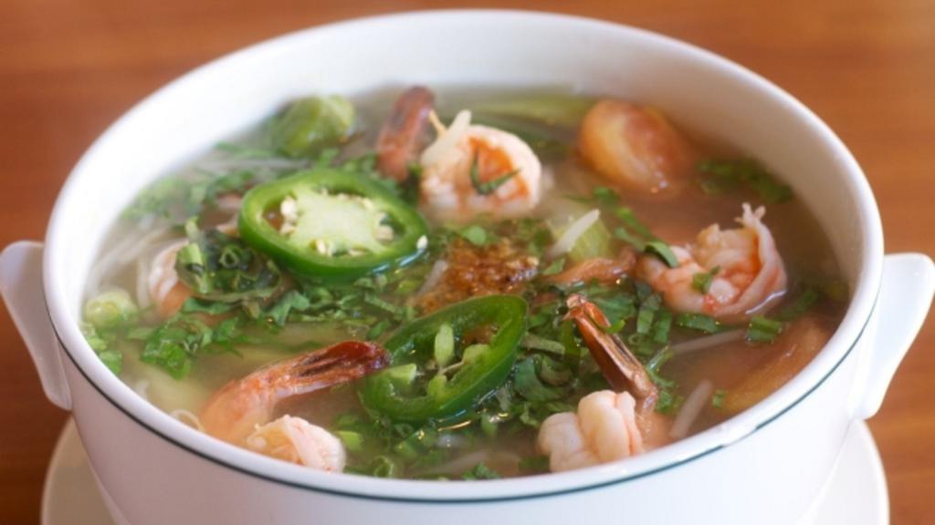 61. Canh Chua Ca · Traditional Vietnamese style hot and sour catfish( or Shrimp) soup with tomato, okra, celery, bean sprout, and pineapple.
