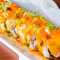Lion King Roll · baked salmon layered atop crab meat, avocado and seaweed sprinkled with  chef's special sauce