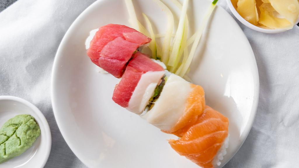 Rainbow Roll · crab meat avocado with salmon, tuna and white tuna