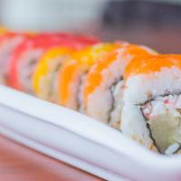 Tropical Paradise Roll · crab meat and pineapple topped with mango, tuna, salmon and chef's special sauce