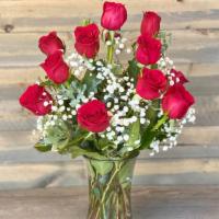  Dozen Red Roses · A dozen roses is a declaration of love and affection; it is a long-awaited confession perfec...