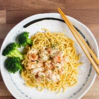 Garlic Butter Lobster · Caribbean Lobster meat with garlic butter sauce, served with broccoli on the side