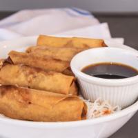 Fried Veggie Egg Rolls  Vermicelli · Wheat flour wrap filled with cabbage, carrots, green beans, mushroom, tofu & onion
