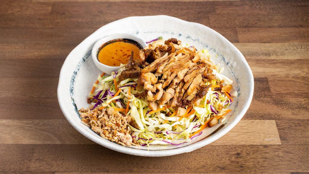 Five Spice Chicken Cabbage Salad · Shredded cabbage, carrots, cucumber and mint leaves, topped with peanuts and fried shallots.