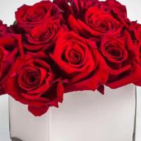 Radiant Red · This bold yet tasteful bouquet is the perfect size for any desk. Radiant in Red makes a grea...