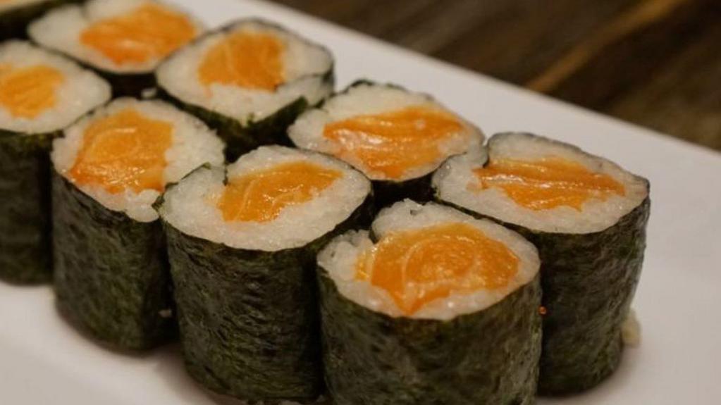Salmon Roll · Salmon, wrapped seaweed and sushi rice. Seaweed on the outside.