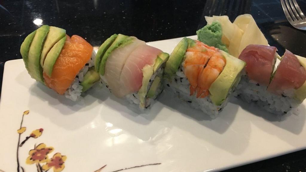 Rainbow Roll · Crab, avocado, and cucumber topped with tuna, salmon, and whitefish.