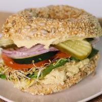 Hummus Delight · Includes lettuce, tomato, onion, cucumber, pickles, sprouts, and hummus.