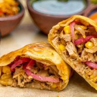 Carnitas  · Slow-braised pork shoulder, pickled red onion, charred sweet corn and roasted tomatillo sals...