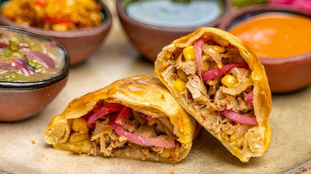 Carnitas  · Slow-braised pork shoulder, pickled red onion, charred sweet corn and roasted tomatillo salsa. 

One hand-crafted pie plus the sauce of your choice.