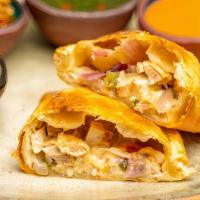 Jalapeno Chicken · Oven-roasted chicken thighs, pickled red onions, jalapenos, pepper jack cheese.

One hand-cr...