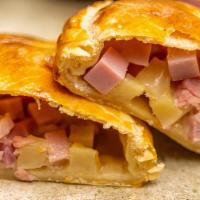 Smoked Ham & Cheese · Smoked pork, yukon gold potato, caramelized onions, four cheeses.

One hand-crafted pie plus...