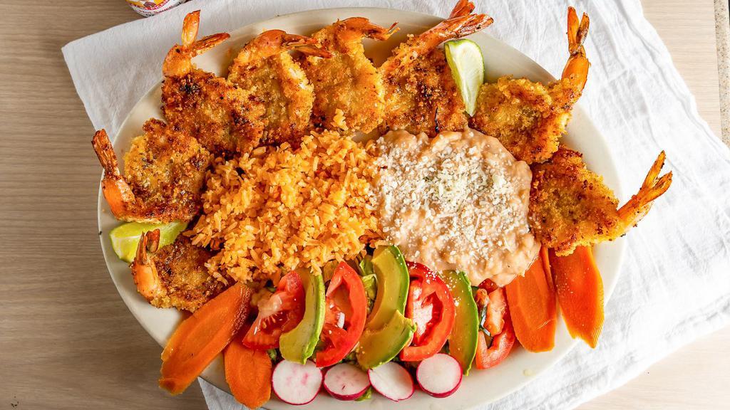 Empanizados · Breaded shrimp with a side of salad, rice & beans
