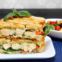 Chicken Pesto Panini · Hot off the panini press! Comes with grilled chicken breast, pesto sauce, roasted mushrooms,...