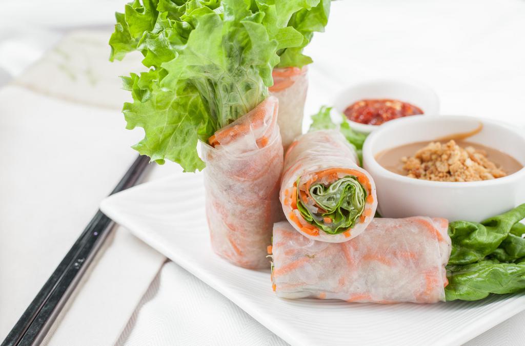 Winter Rolls · Vegan. Contain peanuts. Sautéed jicama and carrots, peanuts, lettuce, and fresh herbs rolled in rice paper served with peanut sauce.
