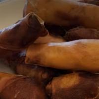 Egg Rolls (2) · Chicken and pork, bamboo shoots, cabbage, onions, and carrots, wrapped in noodle skins and d...