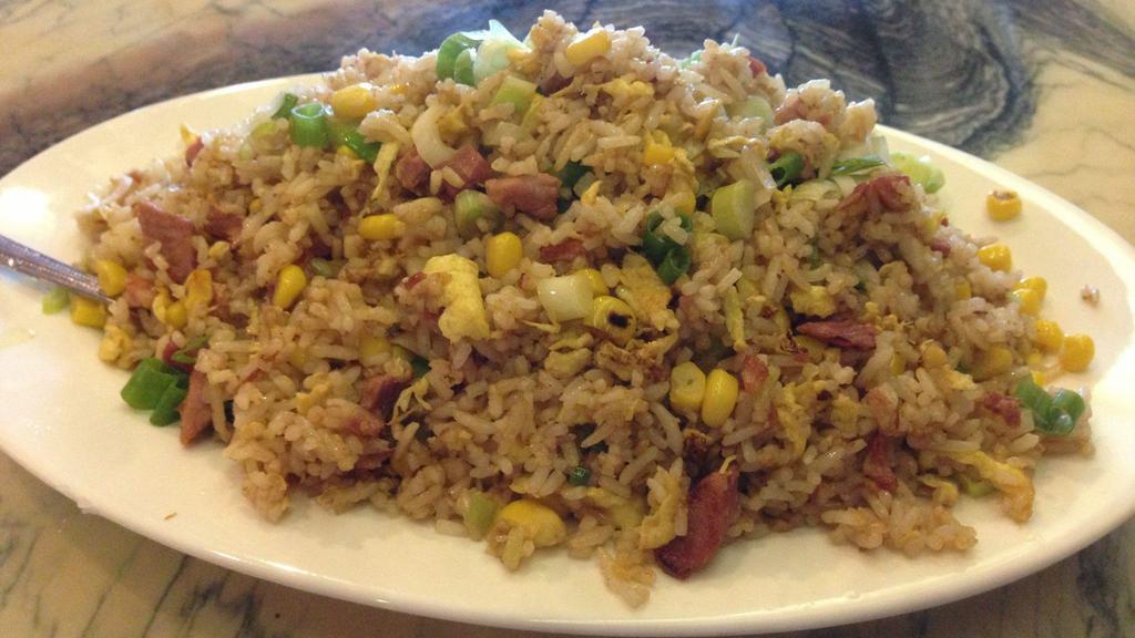 Barbeque Pork Fried Rice · Rice stir-fried with BBQ pork, eggs, and green onions.