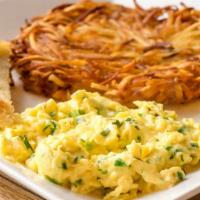 Potter Creek · Two eggs scrambled with fresh herbs, Hash browns & Acme white buttered toast