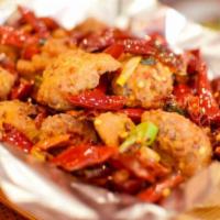 重几 Spicy Chicken Wing · With explosive chili peppers. Popular szechuan wings.