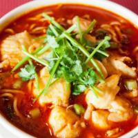 海鲜汤面 Seafood Noodle Soup · With shrimp, mussel, calamari, fish fillet.