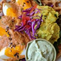 Egg Masala · Boiled eggs cooked in an onion-tomato based gravy served with mashed potatoes and garden sal...