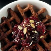 Chocolate Berry · Chocolate and berry compote waffle topped with more berry compote, garnished with mixed seed...
