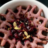 Vanilla Berry · Vanilla and berry compote waffle topped with mixed berry compote, garnished with mixed seeds...
