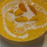 Willow Dew  楊枝金露 · Coconut mango juice with fresh mango, tangerine and sago.