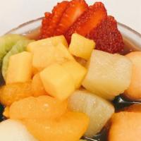 Mixed Fruit with Grass Jelly   B仔涼粉 · Jelly grass topped with strawberry, kiwi, pineapple, watermelon, honeydew, mango, tangerine.