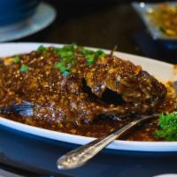 27. Whole Fish and Spicy Bean Sauce豆瓣全鱼 · Spicy.