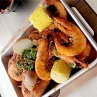 Louisiana spicy shrimp (1 pound) · Head on shrimp in butter and garlic on our special spices mixtures accompanied whit potatoes...