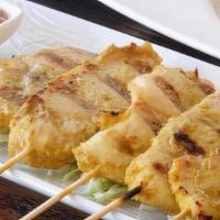 Chicken Satay · Grilled skewered tender chicken breast, marinated with
Thai herbs served with peanut sauce &...
