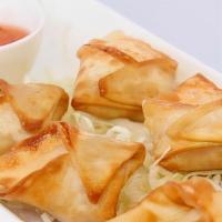 Crab Moon Cheese · Imitation crab meat, Philadelphia cream cheese
and green onions wrapped with crispy wonton s...
