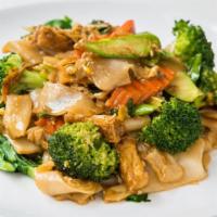 Pad See Ew · Stir fried flat rice noodles, egg, garlic, broccoli, Chinese broccoli, carrots and black bea...