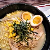 Tonkotsu Ramen  · Slices of tender chashu pork, egg noodles, bean sprouts and green onions in a rich pork broth.
