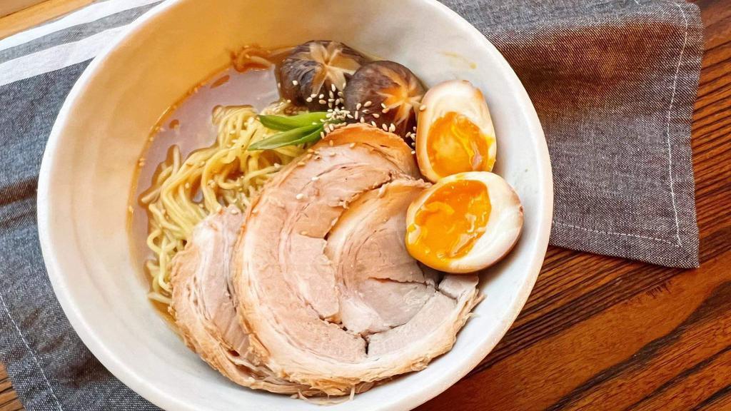 Miso Ramen  · Tender thin slices of housemade chashu, soft ramen eggs, nori and bean sprouts in a mild soy and bonito based broth.