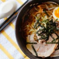 Shoyu Ramen · Tender thin slices of housemade chashu, soft ramen eggs, nori and bean sprouts in a mild soy...