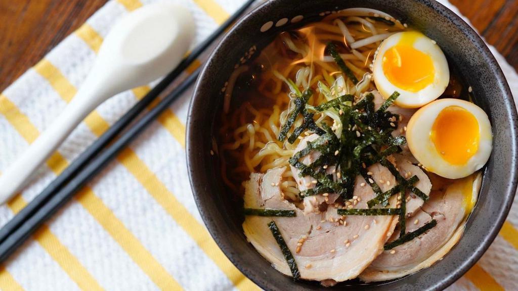 Shoyu Ramen · Tender thin slices of housemade chashu, soft ramen eggs, nori and bean sprouts in a mild soy and dashi based broth.