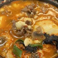 1. Beef Tofu · Tofu boiled with beef and mushrooms.
