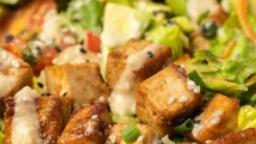 Tofu Salad · Tofu, lettuce, and assorted vegetables, served with special dressing.