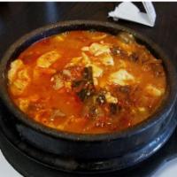 Kimchi Soft Tofu · Tofu boiled with kimchi and your choice of meat. Served with your choice of side and an asso...