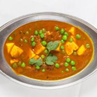 Mattar Paneer · Homemade cubed cheese and peas cooked in spiced gravy.