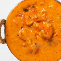 Chicken Tikka Masala · Chicken white meat marinated overnight and broiled in mild tomato butter sauce and herbs.