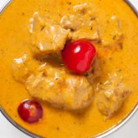 Butter Chicken · Boneless chicken cooked in mild buttery sauce and herbs.