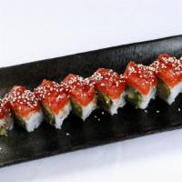 Crazy Roll · Popular.  Shrimp tempura, avocado inside and topped with spicy tuna and unagi sauce.
