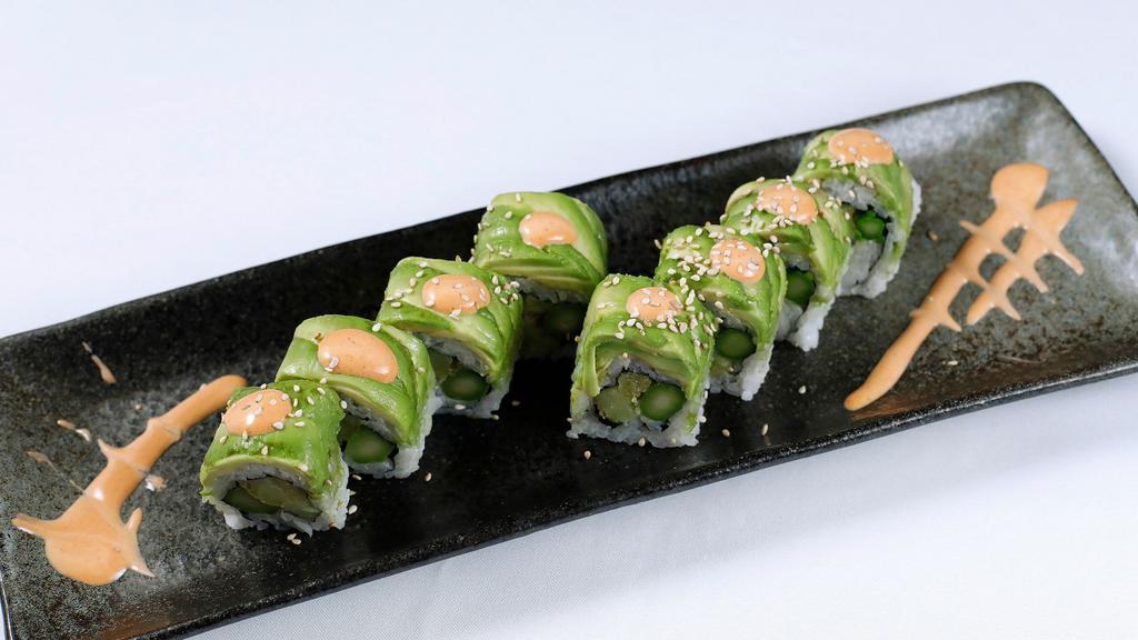 Caterpillar Roll · Unagi, snow crab and cucumber roll topped with avocado, tobiko and unagi sauce.