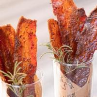 Millionaire's Candy® Bacon · Introducing candied bacon, cooked well done, perfect thickness.... easy to enjoy. . Four del...