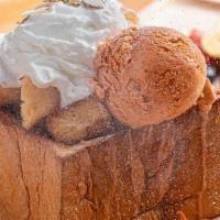 HONEY BRICK TOAST · Vanilla Bean Ice Cream, Almond, Mixed berries & Banana.