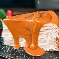 THAI TEA CREPE CAKE (Slice) · Serves with Homemade Thai Tea Sauce.